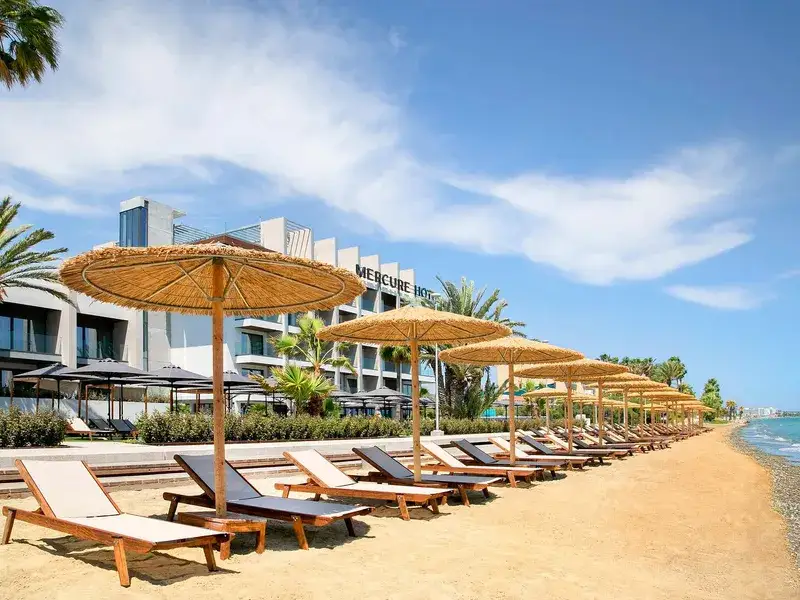 Mercury Hotel beachfront with sun loungers