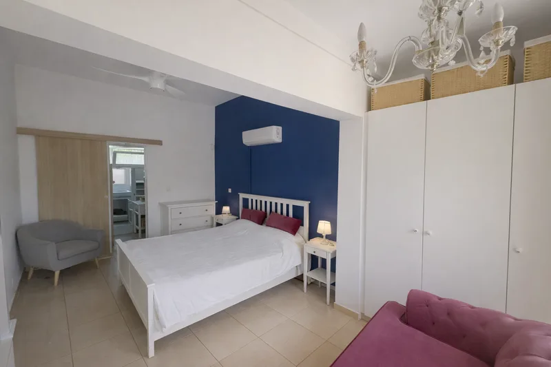 beach house cyprus bedroom modern blue accent wall larnaca