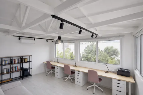 Modern home office with sea view at Oroklini Beach House, Cyprus — ideal for remote work