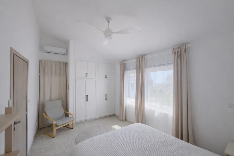 beachhouse cyprus minimal bedroom bright natural light modern interior