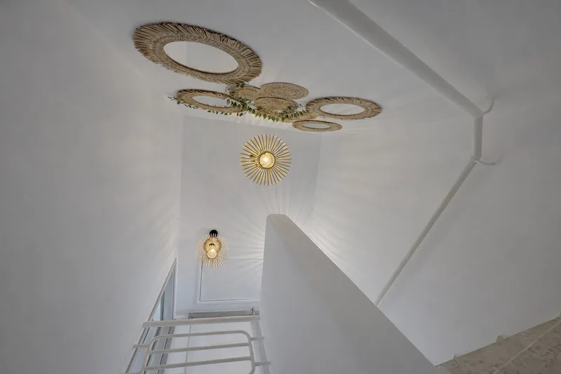 beachhouse cyprus modern staircase design rattan lighting bright interior